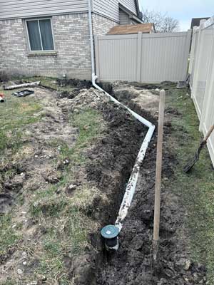 New underground downspout extension piping before buried in Sterling Heights, MI