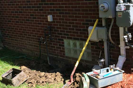 brand new sprinkler system on side of beautiful home Lake Orion, Michigan